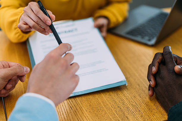 istock Business people signing a contract in the office. 2237562121