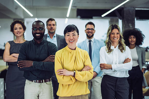 istock Confident businesswoman and her team. 2237562691