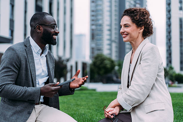 istock Businesspeople talking outdoors. 2237562990