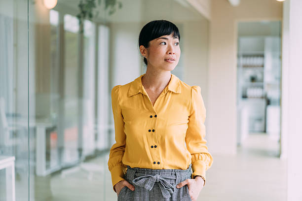 istock Confident businesswoman in modern office. 2237565737