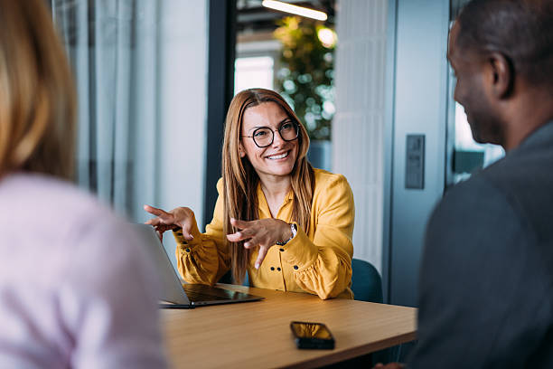 istock Group of business persons talking in the office. 2237566966