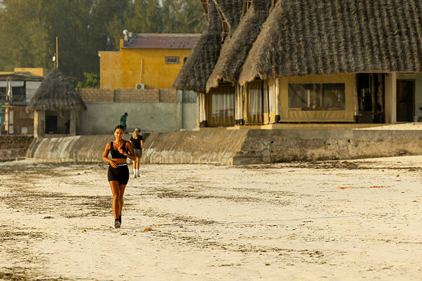 A woman running on the beach