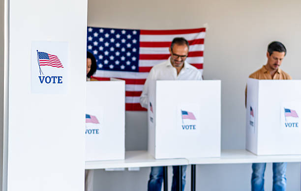 istock People voting in election polling station 2237574583