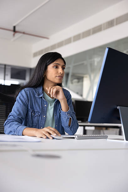 istock Serious young Indian professional woman working on creative startup project 2237580253