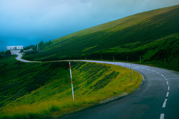 A narrow curved road.Somewhere in scottish highlands