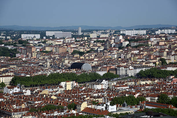 The City of Lyon is the third-largest city in France with a population of 520,700 inhabitants. The image shows the beautiful city seen from a Skyscraper. Capured during a sunny day in spring season.
