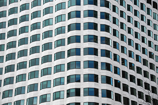 close up on modern office building with blue glass windows
