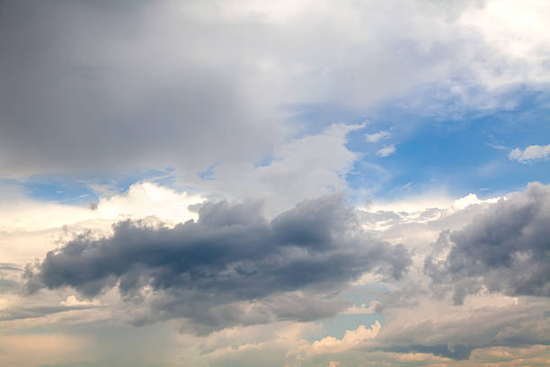 istock Beautiful Cumulus Clouds with Sunlight Reflections 2237583945