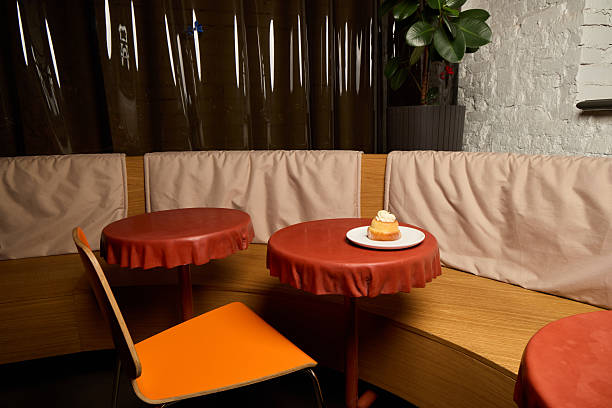 istock The Cozy Cafe Interior features Warm Lighting combined with Comfortable Seating Arrangements 2237594866