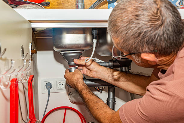 istock Man checking the seal under the sink 2237595085