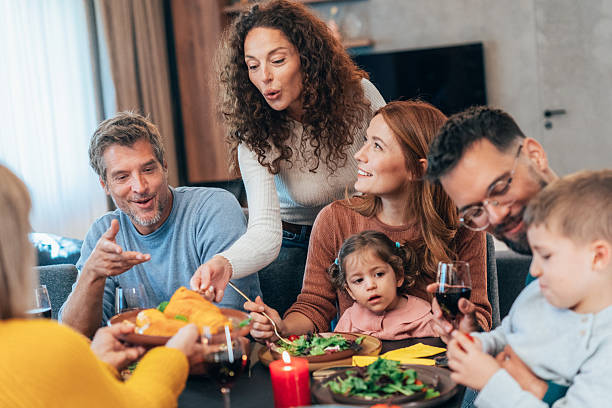 istock Family enjoy Thanksgiving lunch together 2237596557