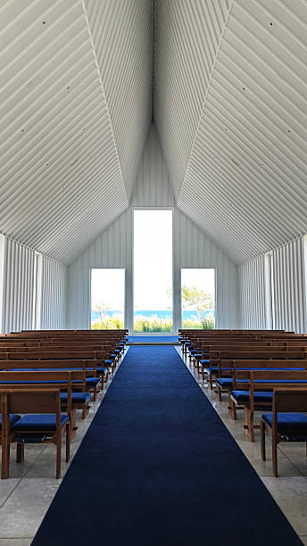 istock Minimalist Modern Chapel Interior with Ocean View and Wooden Benches 2237598746
