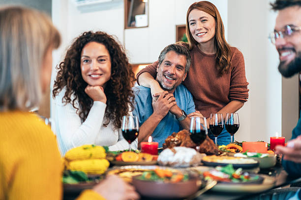 istock Family enjoy Thanksgiving lunch together 2237602089