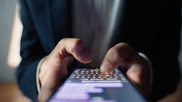 istock Man hands chatting smartphone online macro closeup. User typing text message 2237606262