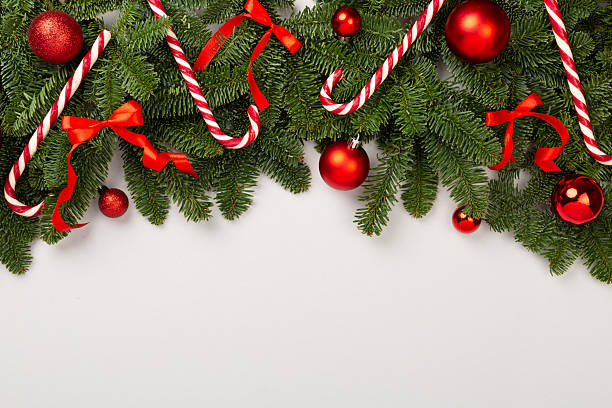 istock Christmas tree branches with festive decoration on color background, top view 2237608246