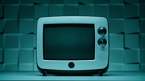 Closeup retro television standing still in isolated room evoking nostalgia. Small screen reflecting vintage design with cinematic symmetry. TV showing obsolete media object in minimal classic style.
