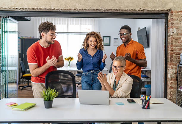 istock Diverse business team celebrating success in office 2237613433