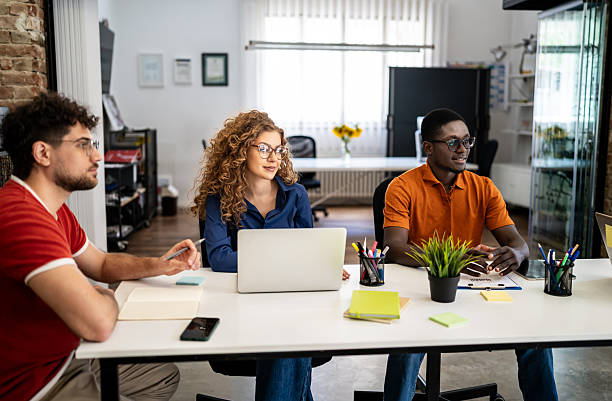 istock Diverse startup team collaborating in modern office meeting 2237613768