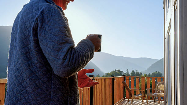 istock Crop of mature man on deck with hot beverage 2237619106