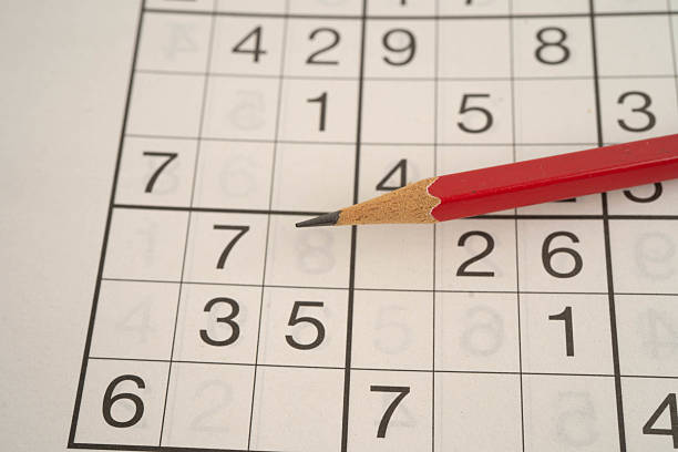 istock Sudoku puzzle, game to play for keep you brain younger for developing Alzheimer disease in senior patient. 2237648106