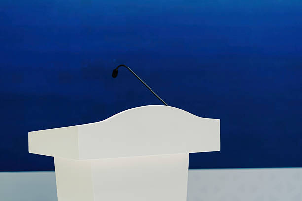 The podium and microphone in the conference room