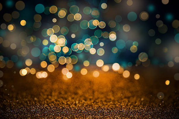 istock Golden Bokeh Lights On Dark Background – Festive Glitter Effect 2237655086