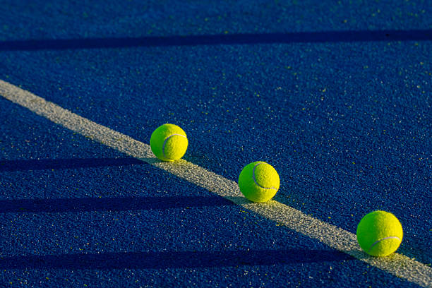 istock Three Padel Balls in a Diagonal Line The Concept of a Graphic Composition 2237657399