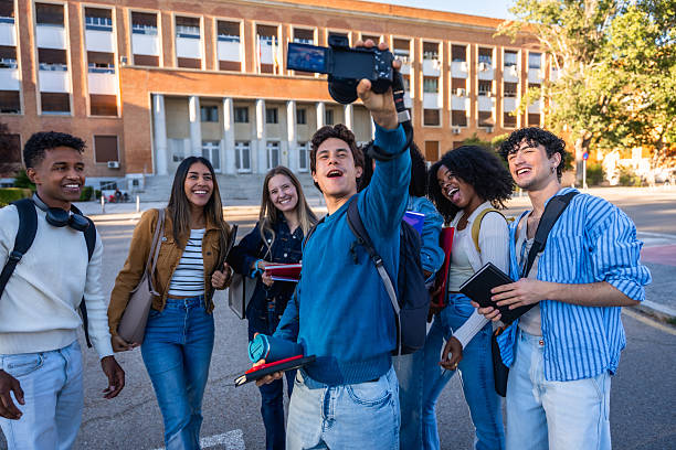 istock Diverse students vlogging campus life with friends 2237658661
