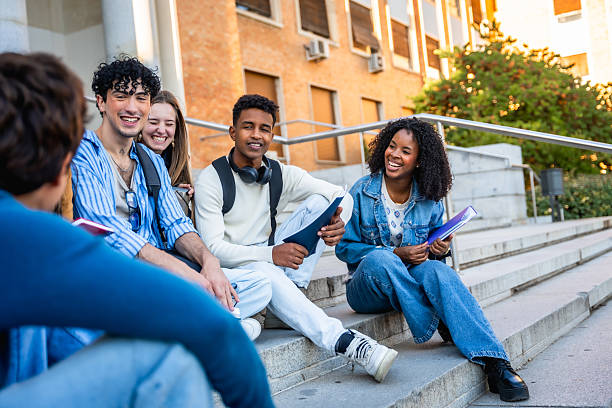 istock Diverse students talking enjoying university life on campus stairs 2237658724