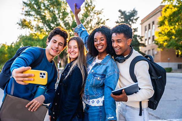 istock Diverse university student friends taking selfie on campus 2237658749