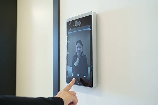 istock Asian woman using facial recognition system 2237659137