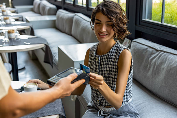 istock Customer using a credit card to tap for payment 2237660455