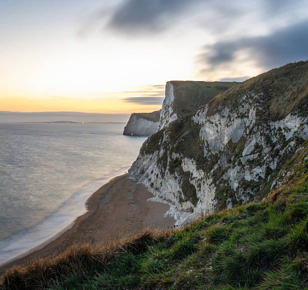 istock Twilight Over the White Cliffs of the Jurassic Coast, Dorset, England 2237660557