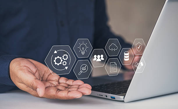 istock Automation of business or robotic process RPA technology. Transfer of data between application. Businessman holding gears icon on network connection. technology visualization. artificial intelligence 2237662295