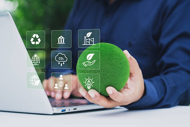 istock ESG concept, Businessman using digital interface on laptop with environmental, social, and governance icons, sustainability strategy, corporate responsibility, carbon footprint, green business 2237662364