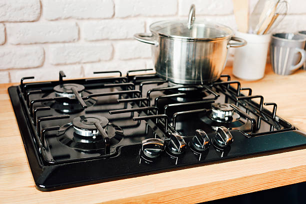 istock Modern gas stove with pot on it in a cozy kitchen setting 2237662382