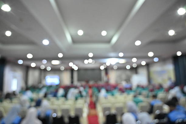 Abstract blurred photo of conference hall