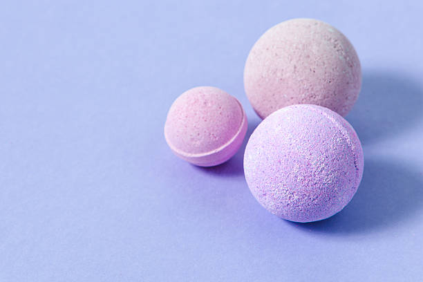 istock Colorful bath bombs arranged on a pastel surface in soft hues for relaxation and self care enjoyment 2237663731