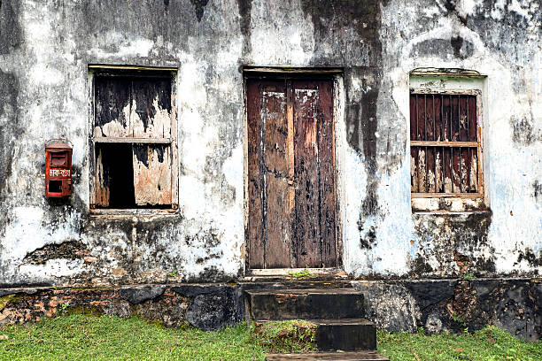 Killa, Degana, Rajasthan, India. A barred window on an old building.