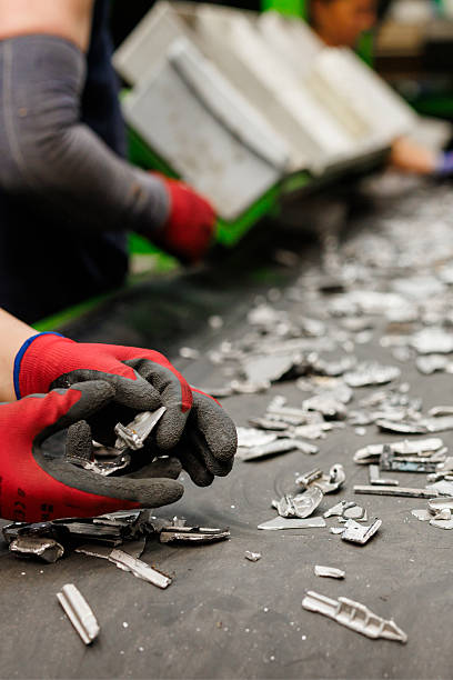 istock Human labor in modern e-waste recycling facility 2237665158