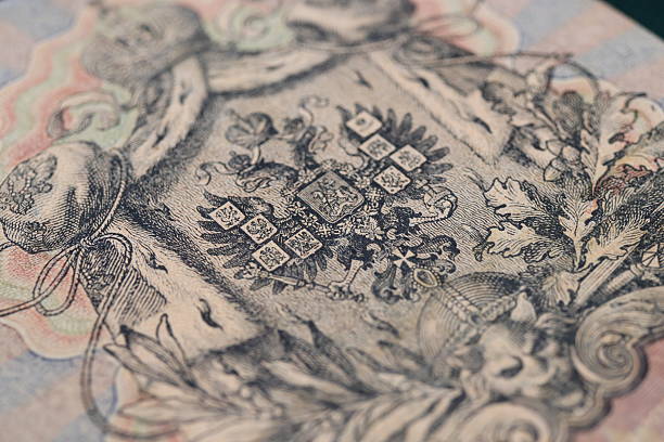 istock Close-up of an intricate design on a banknote featuring ornate patterns and symbols 2237666599