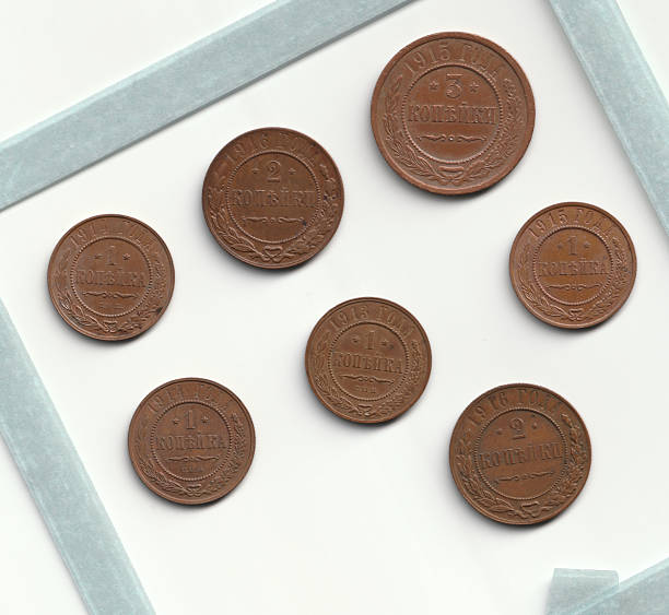istock A collection of vintage coins arranged in a frame, featuring various denominations and years, showcasing intricate designs and historical significance 2237667531