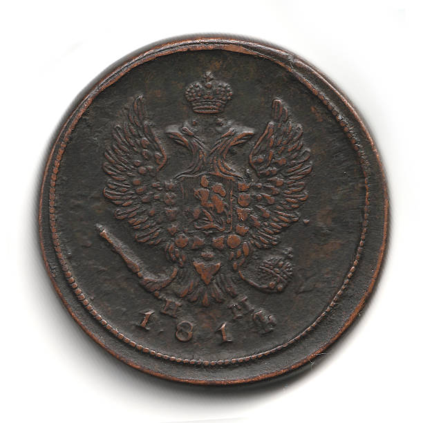 istock An antique coin featuring a double-headed eagle emblem, crowned, with intricate detailing and the year 1814 inscribed 2237667633