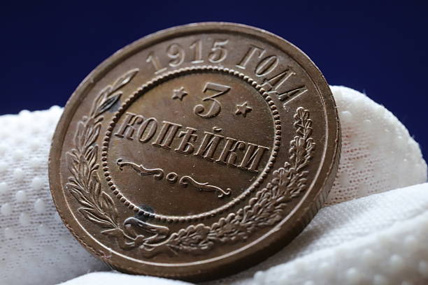 istock A vintage bronze coin from 1915, featuring the denomination '3 ' surrounded by decorative elements 2237669714