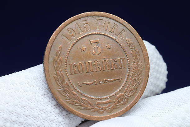 istock A vintage coin from 1915 featuring the denomination '3 ' surrounded by decorative laurel leaves 2237669727