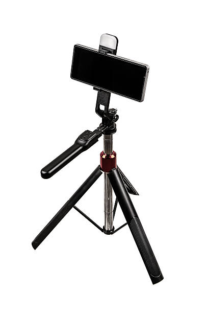 istock A black selfie stick with a tripod stand on a white background. 2237676773