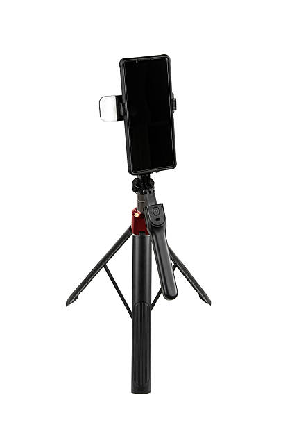 istock A black selfie stick with a tripod stand on a white background. 2237676844
