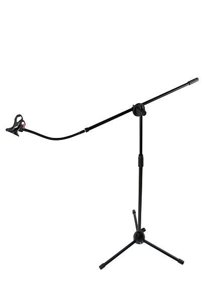 istock Black microphone stand with an extended boom arm and a universal phone clip. 2237676866