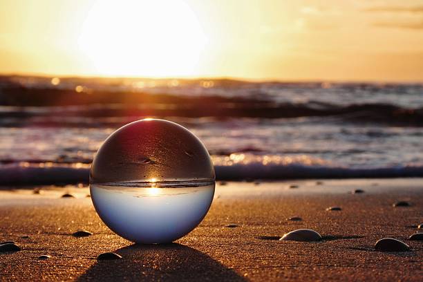istock Crystal ball on Rimini beach at dawn 2237679092