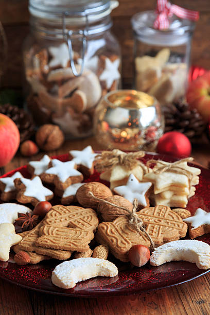 istock Various Christmas cookies on red plates with Christmas decorations 2237686961